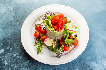 fresh vegetables cucumber tomatoes pepper and salad leaves