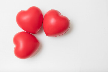 three hearts on a white background one of the hearts of a child. full family symbol