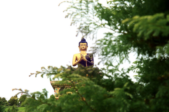 Buddha Park of Ravangla. Beautiful huge statue of Lord Buddha, at Rabangla, Sikkim, India. Gautam Buddha statue in the Buddha Park of Ravangla in South Sikkim. Frame within a frame concept.