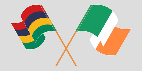 Crossed and waving flags of Mauritius and Ireland