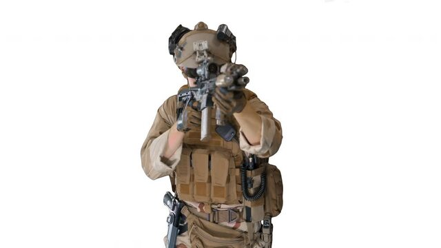 Soldier shoots aming and shooting with rifle on white background.