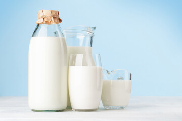 Milk in glass, bottle and jug