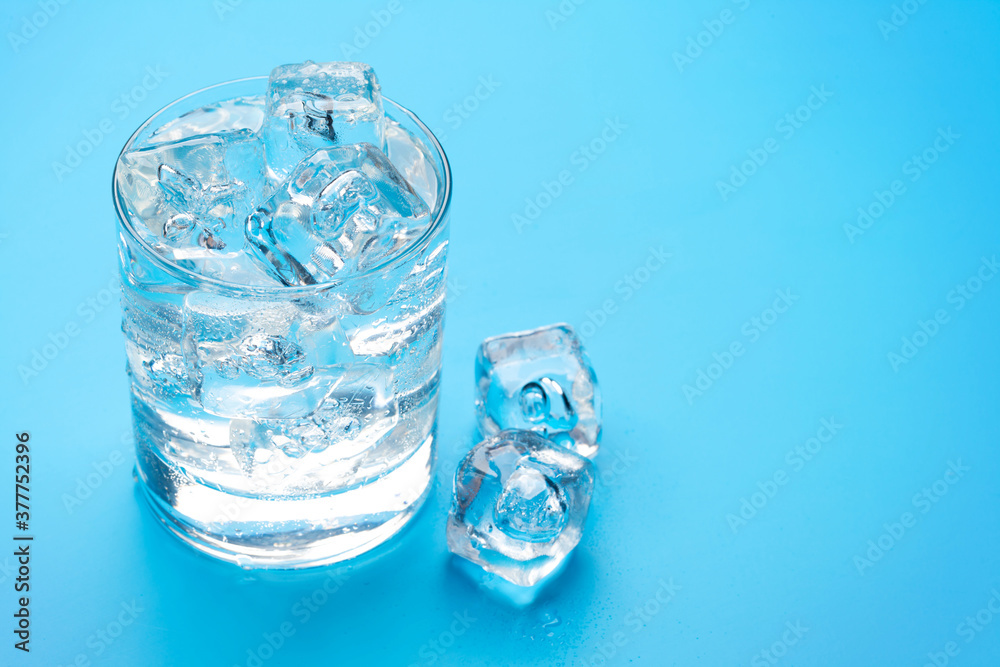 Sticker glass of water with ice cubes