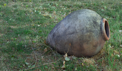 An old pitcher on the ground