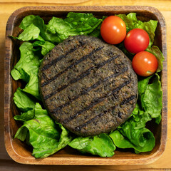 Veggie Burger with salad