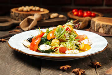 Greek vegetable salad with feta cheese and olives
