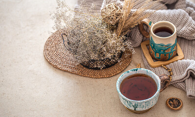 Cozy home still life with a Cup of tea on the table.