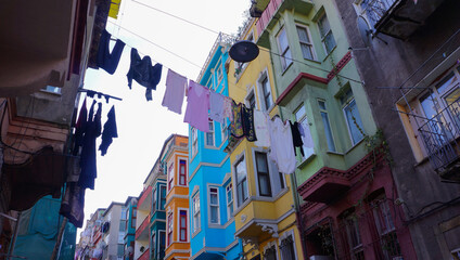 Street in Istanbul with colorful buildings and drying clothes 