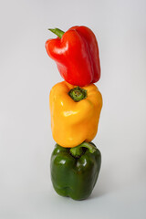 
multicolored peppers on a white background