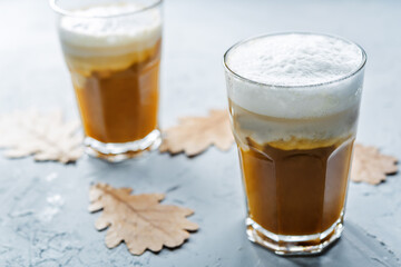Pumpkin spice latte with whipped cream and cinnamon
