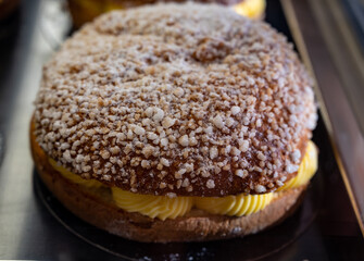 French fresh baked sweet filled brioche pastry tarte tropezienne in confectionery shop in Saint-Tropez, Provence, France