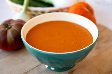 Spanish summer vegetables cold gazpacho blended soup made from tomatoes, cucumbers, onion, raw...