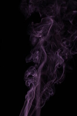 purple smoke from incense on a black background