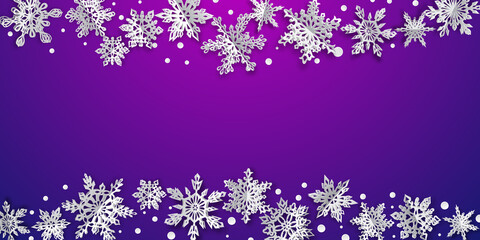 Christmas background with volume paper snowflakes with soft shadows on purple background