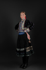 Beautiful woman wearing traditional Eastern Europe folk costumes. Slovak folk costumes.