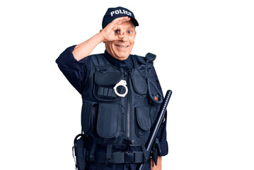 Senior handsome man wearing police uniform smiling happy doing ok sign with hand on eye looking through fingers
