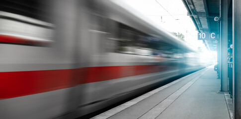 Abstract background travel of public transportation with blur speed motion movement of train on railway tunnel subway.