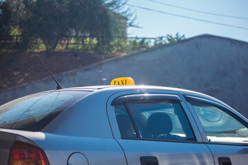 Fototapeta na wymiar Detail of the taxi car on the street