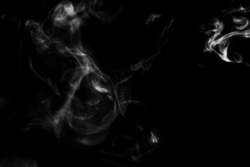 White natural steam smoke effect on solid black background with abstract blur motion wave swirl use for overlay in pollution, vapor cigarette, gas, dry ice, hot food, boil water 
