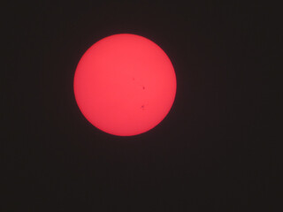 Red Sun In Smoky Sky