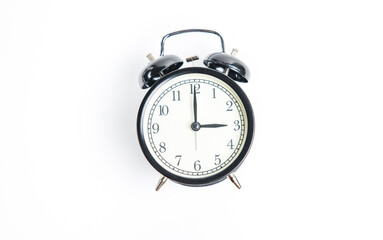 alarm clock isolated on white 3:00