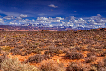 La Sal mountains seen in the distance from Arches National Park
