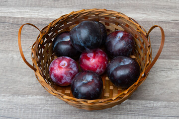 plums in the basket