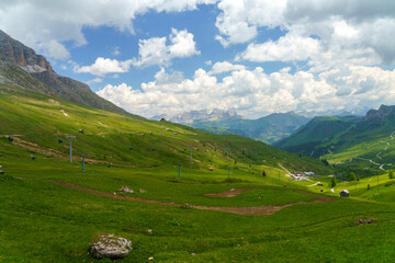 Fototapeta na wymiar Mountain landscape along the road to Pordoi pass, Dolomites