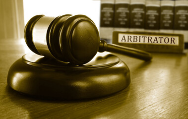 Arbitrator name plate and legal gavel - obrazy, fototapety, plakaty