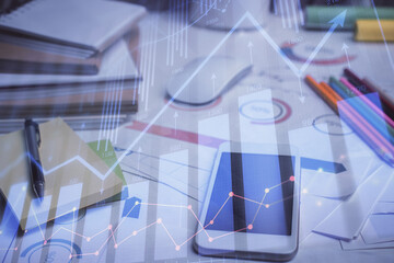 Double exposure of forex chart drawing and cell phone background. Concept of financial data analysis