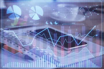 Double exposure of forex chart drawing and cell phone background. Concept of financial data analysis