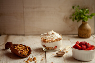 Delicious Strawberry parfait on a wooden background