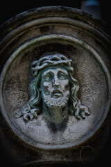 An ancient statue of Jesus Christ crown of thorns. Vertical image.