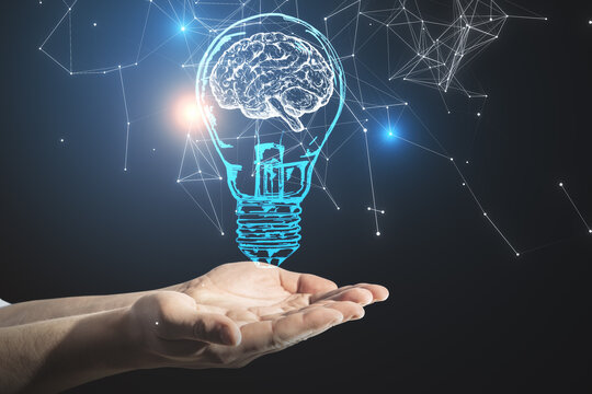 Hands holding creative light bulb with brain hologram and polygonal.