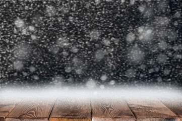 christmas background with wood table top and snowfall