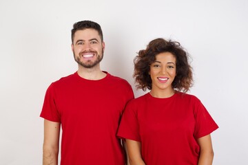 Fototapeta premium Young caucasian man with short hair wearing colorful shirt over isolated yellow background with a happy and cool smile on face. Lucky person.