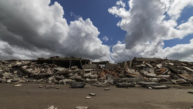 Timelapse of the clouds with trees in the scene and camera panning. Villa Epecuen abandoned city from Argentina