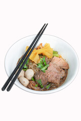 Noodles soup with beef isolated White Background with Clipping Path.