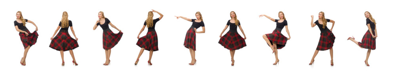 Beautiful young woman in plaid dress isolated on white