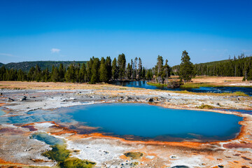 Blue hot pool in Biscuit bassin in Yellowstone