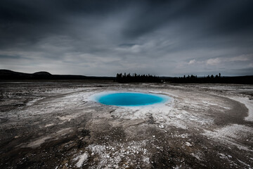Bad weather over blue Opal pool