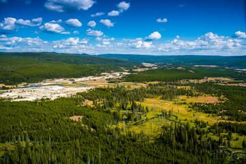 Panoramic view of Yellowstone upper and lower geyser bassin and the Firehole river valley