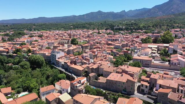 Panoramic aerial view of Prades cityscape with buildings and streets, Tarragona, Catalonia, Spain. High quality 4k footage