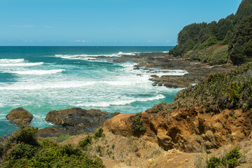 Rocky coastline of the Pacific Ocean at the Neptune Viewpoint near Newport, Oregon, USA