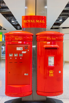 London, UK - May 12 2018: Royal Mail Post Box And Stamps Vending Machine At Heathrow Airport