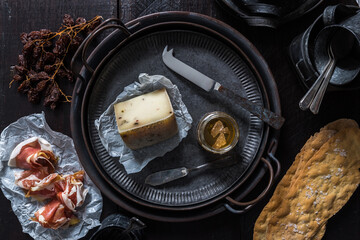 French Cheese with rustic tine tableware & cutlery