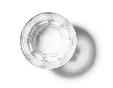 A glass cup of water on a white background