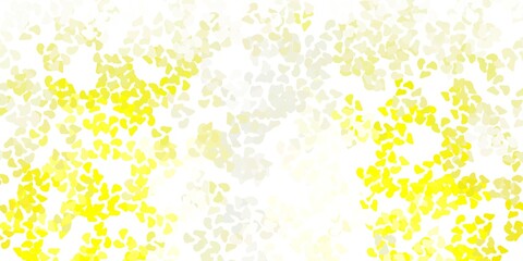 Light yellow vector texture with memphis shapes.
