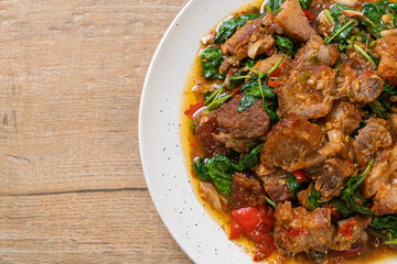 stir-fried crispy pork belly and basil