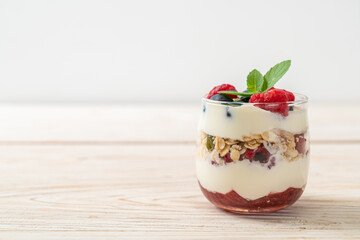 homemade raspberry and blueberry with yogurt and granola